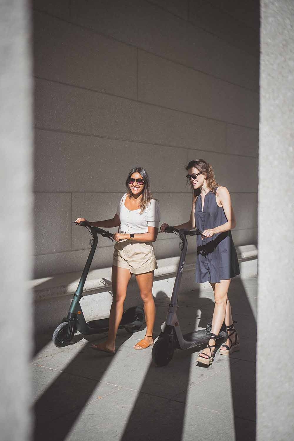Two women on E-scooters